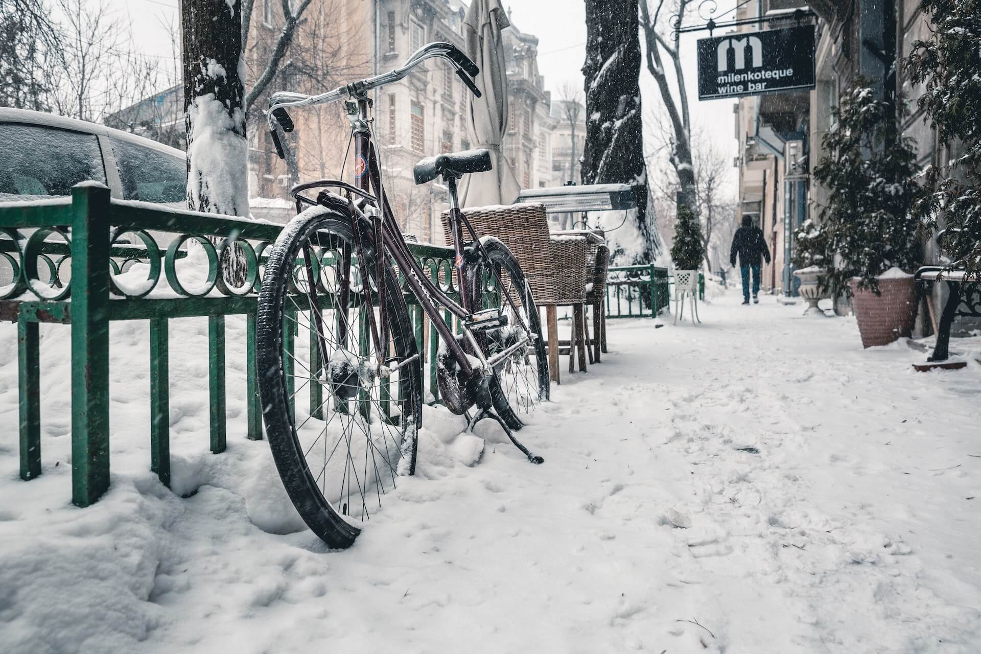 bike on the sidewalk in winter